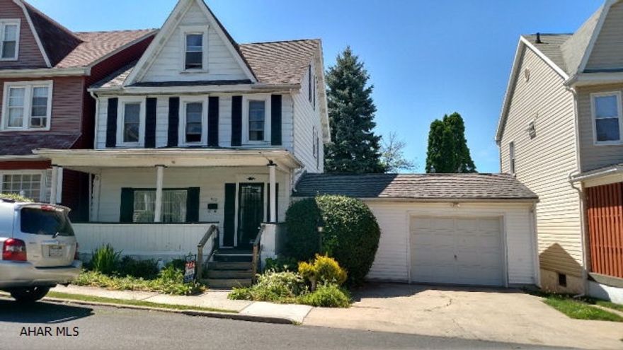 The five big bonuses to this property are the DOUBLE LOT, the ATTACHED GARAGE, the COVERED FRONT PORCH, the HUGE DECK, and the NICE NEIGHBORHOOD. Also worth mentioning is the concrete pad just outside the basement walkout. Motivated sellers. The neighbor's fence (behind this property's garage) encroaches onto the property by a few feet. The sellers gave the neighbor permission years ago to put their fence on their property. This was all verbal and not recorded. Buyers will need to acknowledge at closing  that the neighbor's fence encroaches on the property.