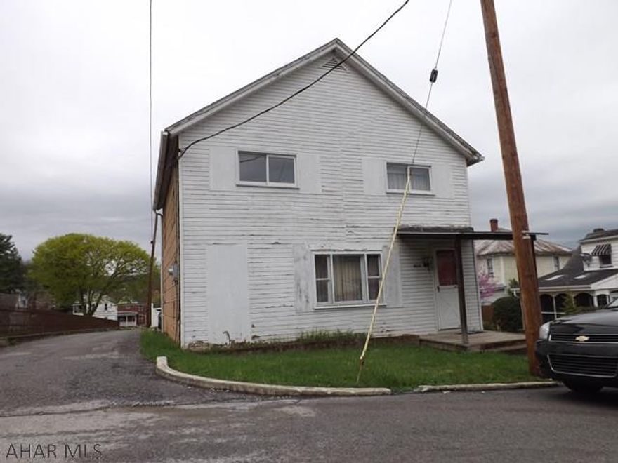 This home is a Handyman Special.  Very quiet neighborhood with a corner lot.  This home could make a very nice investment property or a great 'Fixer-Upper'.   The assessed value of this home is $50,800.