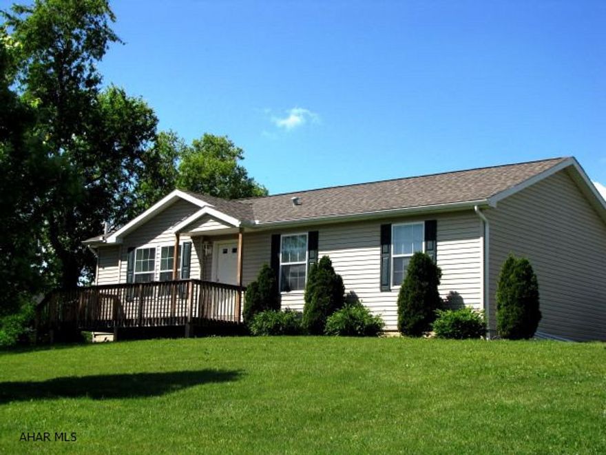 Clean! Well maintained! Ready to move into. End of street lot with great views, large eat-in kitchen, oak cabinetry, walk-in pantry, 3 bedrooms, 2 full baths, unfinished basement with high ceilings and a potential for a huge family room (42.8 x 24.4). 2 Car garage, kennel, patio, front porch deck, must see!