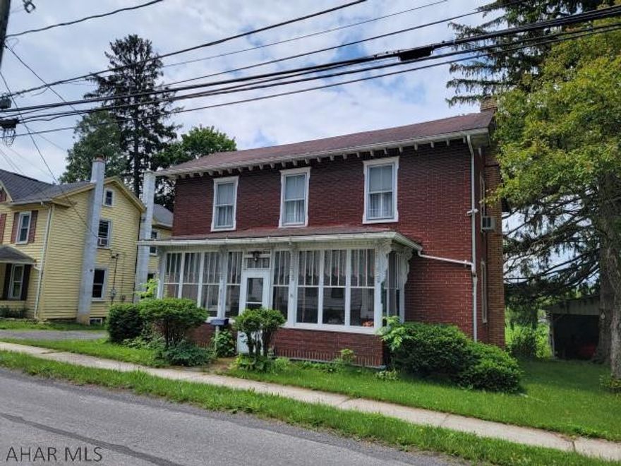 2 story, 3 bedroom home on large lot in Warriors Mark. Modern kitchen. Enclosed front and rear porches. Carport with workshop.