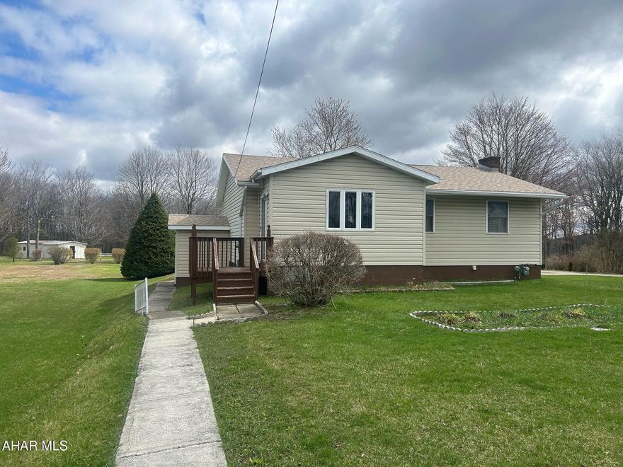 This ranch style home sits on one plus acreage of level ground with a detached garage and shed. This home is very well kept offering three bedrooms, two bathrooms, and a partially finished basement. The home has hardwood floors throughout and tile in the bathroom and laundry areas. Please call the listing agent for a private showing.