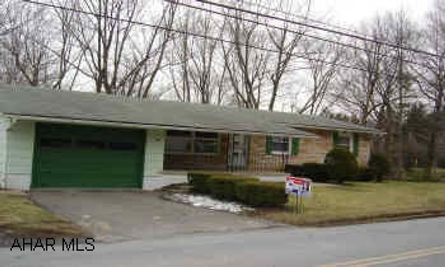 Has a Florida room. 3 Bedroom rancher, large corner lot, hardwood floors.    Tax ID #'s are   14-10B-24-1 & 14-10B-24-2