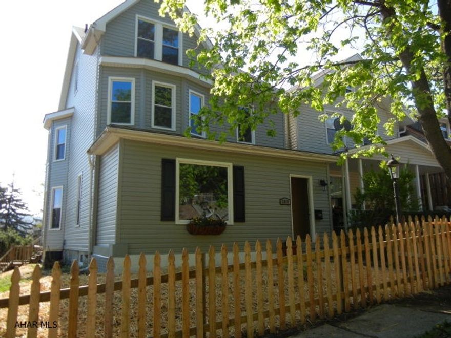 Exceptionally nice, fully remodeled house in convenient location.  Huge rooms, new mechanicals, light fixtures, etc.  Rear deck is two levels, great for summer entertaining.  Off street parking at rear.  Fantastic view of the city.