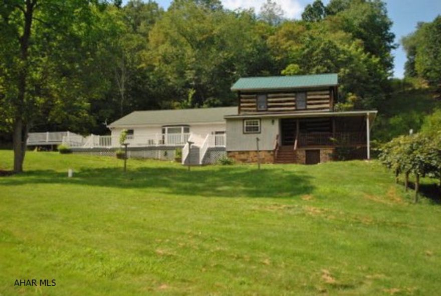 Unique 7 BR, 2.5 BA home located in a private setting. Detached 2-car garage. Tons of character and opportunities.