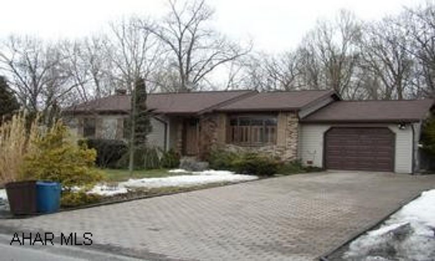 ONE STORY WITH FINISHED LOWER LEVEL.  ONE BEDROOM WITH BATH ON LOWER LEVEL. LOGAN TWP.  THE EASE OF ONE STORY LIVING.  THIS WELL BUILT HOME FEATURES EAT-IN KITCHEN, PRIVATE REAR PATIO, WOODED SETTING IN REAR, AND TOTALLY FINISHED LOWER LEVEL.  VERY LOW UTILITIES.  OUTBUILDING 12X12.