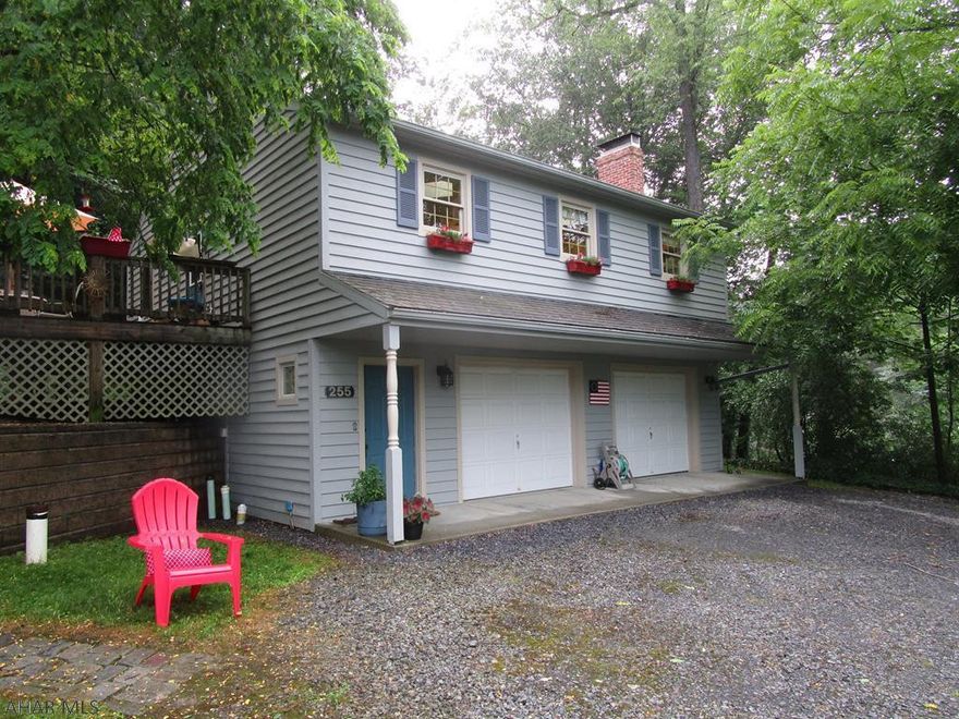 Superbly maintained river front home! This property with scenic river views is situated along the Raystown Branch of the Juniata River but not located in a flood zone! Step down to the river to kayak, canoe, fish or just enjoy the sound of the flowing river.  The home offers a mud room w/ slate floor, open living room w/ a vaulted ceiling and cozy wood stove, kitchen with breakfast bar, 2-bedrooms, and a full bath w/ c. tile floor. Wide plank pine board floors, large skylights throughout for natural light and recessed lighting. Full basement with an over sized two-car garage/workbench, laundry room and 200-ampere electric. Relaxing sun deck, terraced yard with interlocking block retaining walls and a large driveway w/ room for RV parking and RV electric hook-up. Very convenient location!!