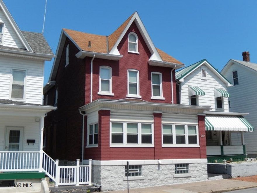 Good looking Brick home. 4-5 Bedrooms, 2 full baths. 2 enclosed porches. 2 car garage. Roof 2009. Large rooms. Well taken care of. Original high ceilings.