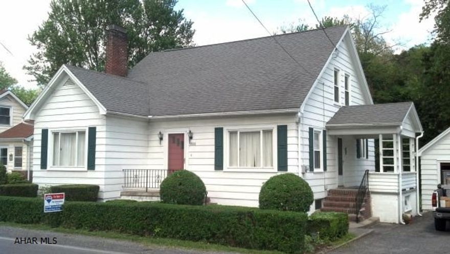 Such a warm and cozy home - huge double living room/fireplace, really nice large eat-in country kitchen, new laminate flooring, new sliding glass door to rear deck, 1st floor bedroom and bath, 1 car detached garage, large usable walk-out basement, nice lot, stocked trout stream out back! Must See!