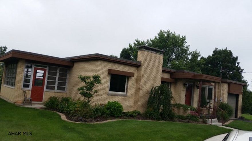 3Br Brick Home on 1 acre, Oak flooring throughout entire house except kitchen & bath, Beautifully landscaped, sunroom off of dining room, new kitchen, Immaculate home!