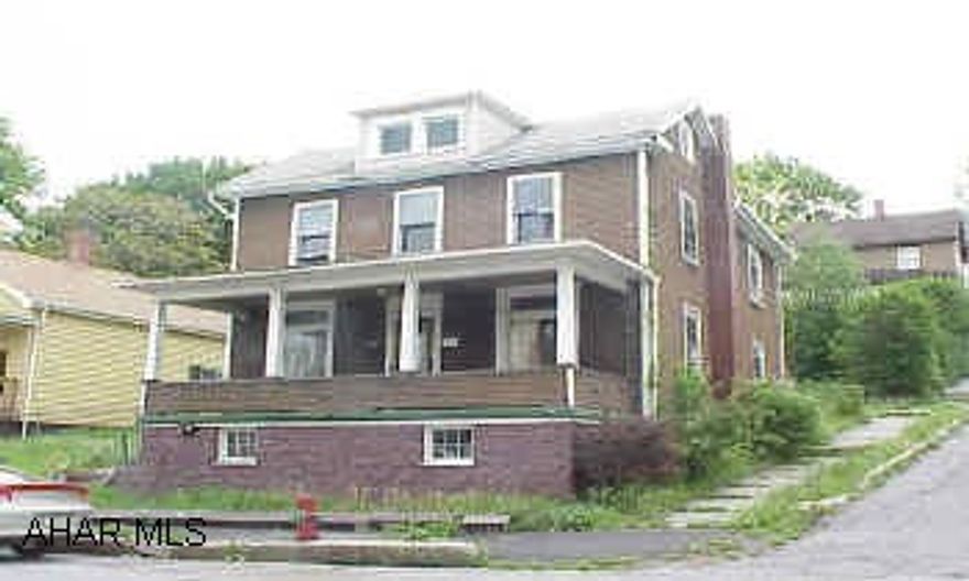 Tons of potential.  1st floor laundry and 1/2 bath.  Large rooms.  Hardwood floors.