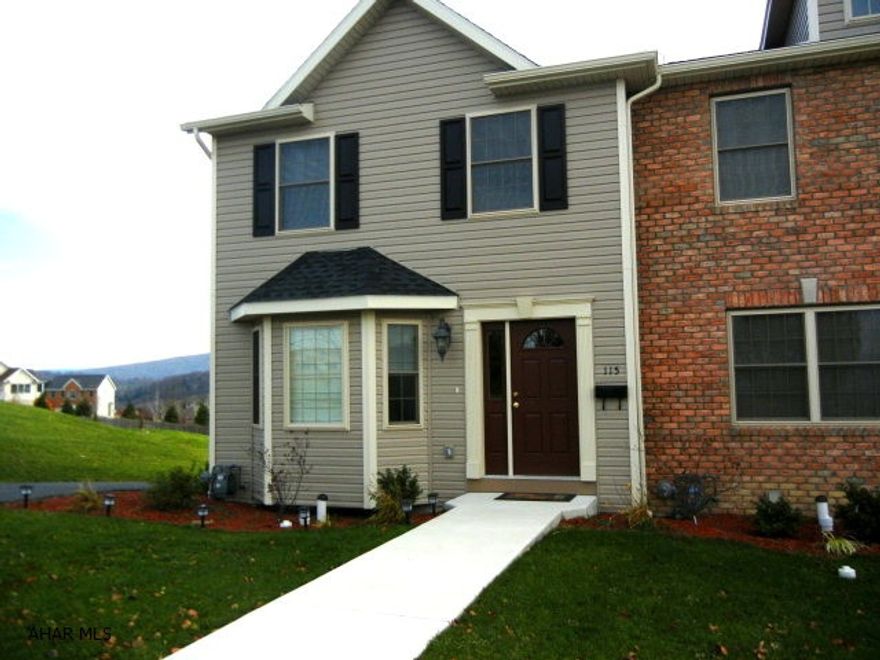 Beautifully maintained one-year old townhouse.  End unit with extra parking space.  Large private deck with fantastic view overlooking Holliday Hills area.  Common area maintenance fee of $43 per month includes lawn care and snow removal.