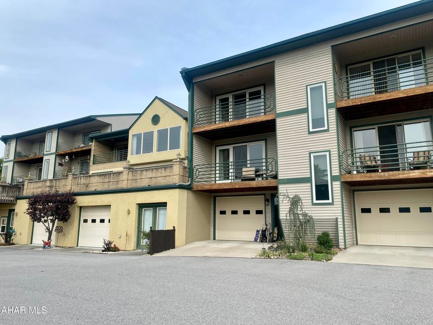 With breathtaking views of Canoe Creek State Park this one of a kind completely renovated condo has so much to offer.  On the main floor you will find an open living room with sliding glass doors to a private balcony, kitchen, dining, breakfast nook, half bath, and private rear patio freshy landscaped.  The second floor features two bedroom, two bath, and laundry.   The primary suite includes full bath, walk in closet, and private balcony.  See complete list of improvements and schedule your private showing to fully appreciate all there is to offer.  Home Warranty with accepted offer.