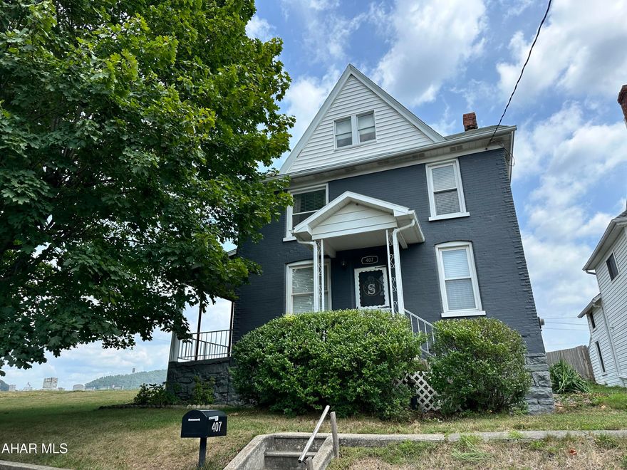 The charm of this brick 2 story situated on a large corner lot in the borough of Roaring Spring. This 4 bedroom home has newer carpet, updated full bath. The main level has a nice sized living room with new carpet and a bonus area that could be an office or play area. The kitchen has newer laminate flooring and other updates. There is a dining room that has access to a side porch. There is a full unfinished basement with laundry, the sellers started to add a 3/4 bath and will include all items to finish the project. This home also has a 2 car detached garage.
