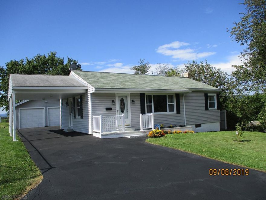 COMPLETELY REMODELED- with nothing left to do but move in, unpack and enjoy your life!... Hardwood floors were all just done over and turned out gorgeous!  The kitchen is lovely and offers a "nook" area to put a small table and there is also "dining area" in the living room as well.  There is a door in the kitchen that leads out to the rear deck.  The bedrooms also have nicely done hardwood floors,  nice closets as well.  The basement is nicely finished to include a spacious family room, bar area, and another area that would be great for a Craft room with LOTS of cabinets and counter top.  Also 3/4 Bath just done over.  Nice 2 car detached garage w/2 openers AND a space large enough for a workshop area as well. Home sits on 1/2 acre dead end street.