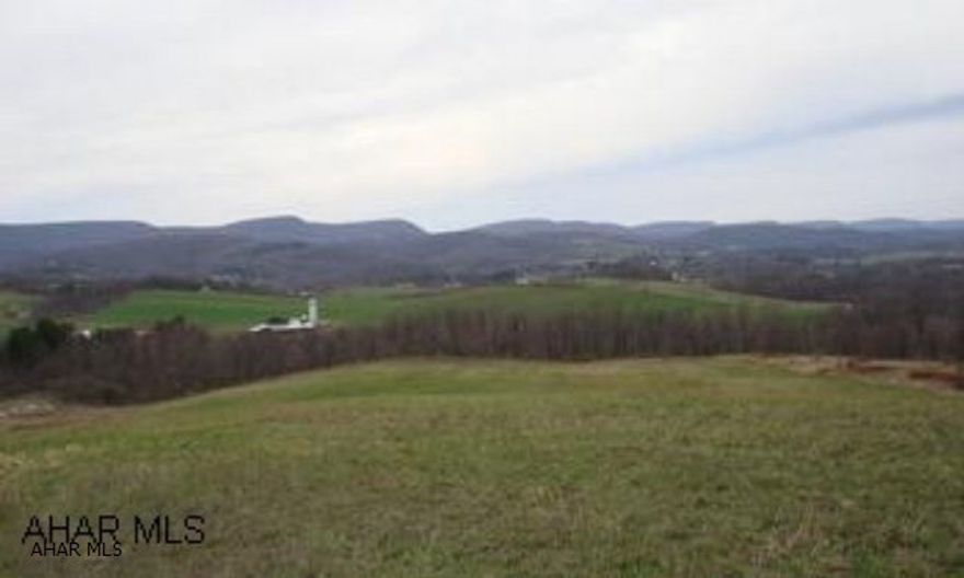 Tremendous View! Perfect home site or home sites. Public sewage is available, but not on property. Must drill well, have plans for building lots, sizes, etc.
