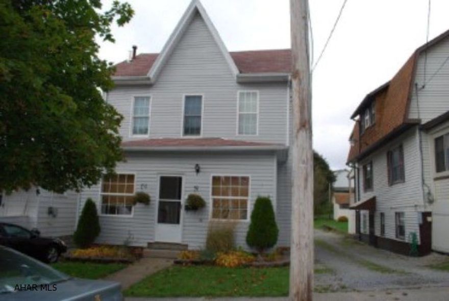 Don't miss the opportunity to see this well-maintained property.  Enclosed front porch, covered back deck, spacious rooms and a walk up attic.  All you need to do is move right in.  Won't last long.