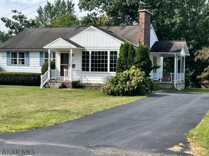 Location! Location! Location! Cozy 3 bedroom, 1 bath house in a great location. Beautiful hardwood floors. Wood burning fireplace in the living room. Original french doors. Central air. Ample storage space. Attached garage. Workshop area in basement.