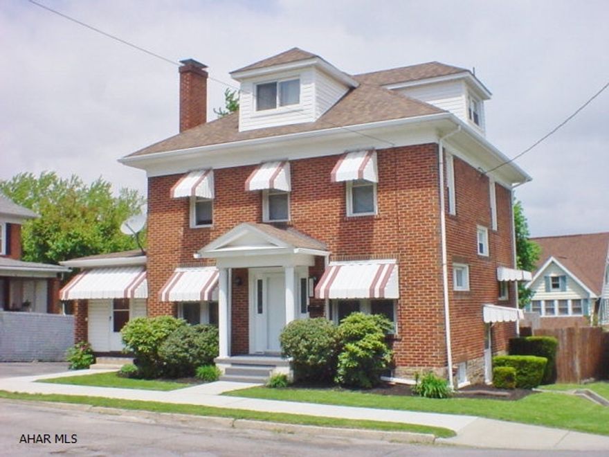 Motivated Sellers! Fantastic corner brick 3 bedroom home in Fairview! This home offers an inviting living room with fireplace, formal dining room with large picture window, updated kitchen with tile flooring, sunroom & tastefully updated bath. Thermo pane windows, new cement sidewalk, off-street parking and more! View this home today!