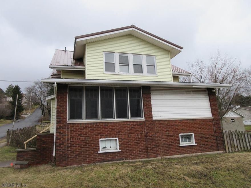 Eldorado area 1.5 story brick and vinyl home. Large living room with ornamental fireplace, formal dining room, large enclosed front porch. Nice fenced in yard with 1 car detached garage and storage shed. Needs some work, but nice area and good possibilities.  Property sold AS-IS. Seller will make no repairs. Offers must be submitted through HUD approved broker. Buyer pays both transfer taxes. Exclusive Agency. Equal Housing Opportunity. Marketed by Olympus AMS www.olympusams-re.com. www.HUDHomestore.com