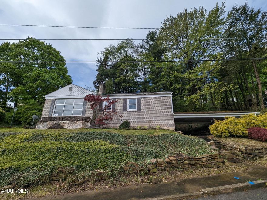 Altoona brick rancher home in Calvert Hills! Large living room with brick FP, adjoining kitchen and dining area. 3 bedrooms, 1 full bath plus semi-finished basement with 1 car integral garage plus large attached carport. Loads of possibilties in a great, quiet neighborhood! Asset built prior to 1978, lead based paint potentially exists. May qualify for seller financing (Vendee). Plumbing system failed pressure test. Buyer pays both transfer taxes.