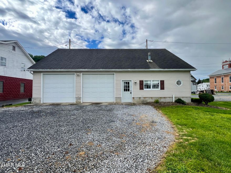 Check out this spacious 38'x48' Garage located in the Everett Borough. This versatile garage features two 9' x 10' doors, making vehicle access easy and efficient. The property is equipped with forced air heat and air conditioning, ensuring comfort year-round. The 200-amp electrical service provides ample power for your projects and upgrades. Above the garage, you'll find a large partially finished area that offers excellent potential—ideal for transforming into an apartment, home office, studio, or additional living space. Outside, the property boasts a large, level yard with frontage on both the street and alley, providing convenient access. Whether you're looking for a functional garage, a potential rental unit, or a flexible workspace, this property offers many possibilities for a new owner. Municipality water is located on the street in a curb box and municipal sewer is available per the borough.