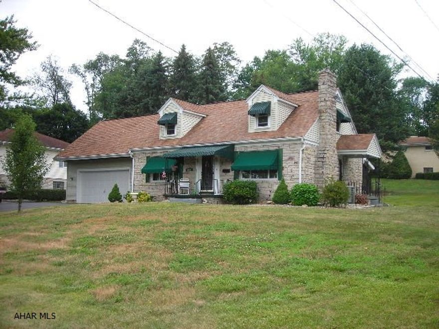 Fantastic stone & vinyl 2 story, on a corner lot, in a very disirable neighborhood, close to mall & schools. 2 bedrooms with possibly making a 3rd, 1st floor laundry, screened rear porch (great for entertaining) 2 car attached garage, new central air, remodeled baths, 2 smoke det., all window treatments and exterior awnings also included. Hurry and make this your new address.