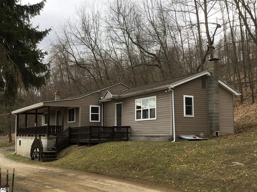 Nearly 18 acres with a view.  Make it your full time home, peaceful getaway, hobby farm or hunting cabin.  Many possibilities!  Seller has made some repairs but chooses to sell AS IS!  4WD is needed to access.