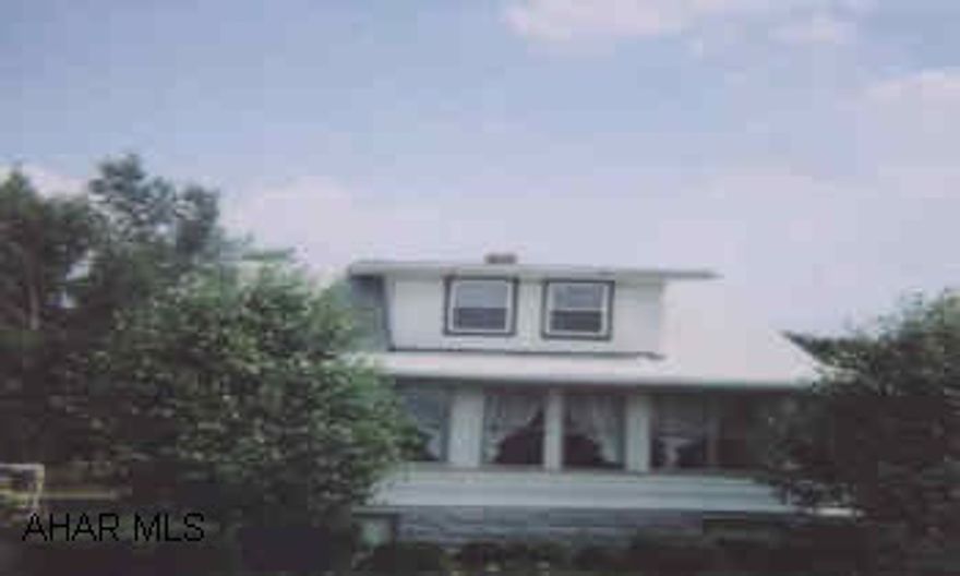 WALL BETWEEN KITCHEN & FAMILYROOM CAN BE REMOVED. ENCLOSED FRONT PORCH. SOME NEW WINDOWS.