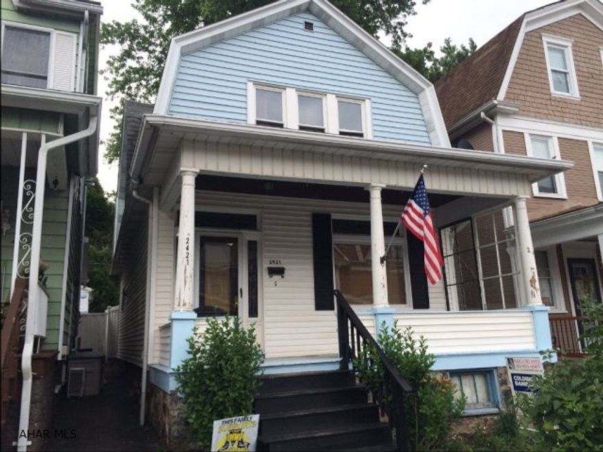 Handyman or Investor! Close to Dysart Park.  Charming 3 bed home with original woodwork, hard wood floors, stained and leaded glass windows and pocket doors.  Vinyl siding, thermopane windows, newer ghw furnace and hot water heater, and updated electric.  Exterior walls and attic have been insulated for efficient heating, and some new drywall and wiring. Some finishing needed with miscellaneous materials already there. Excellent mechanics so finish work not expensive. 1 car detached garage with carport, privacy fence. Being Sold As Is. Buyer to be responsible for any required or desired repairs.