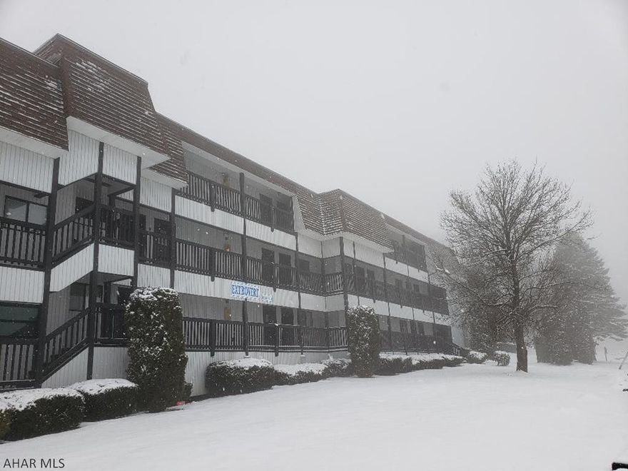 There's lots of room for you & your friends in this 3rd-floor 2-bedroom 2-bath condo with wetbar, fireplace, balcony, located across from the tennis court & outdoor pool.  Furnished and tastefully decorated.  Enjoy the amenities of this 4 season resort.  $256.00 monthly association fee includes outside maintenance, road maintenance, tennis, hottub, outdoor pool & trash removal.  (skiing & golf for a fee). Sq ft per tax card - buyer to verify sq ft & taxes. J-471