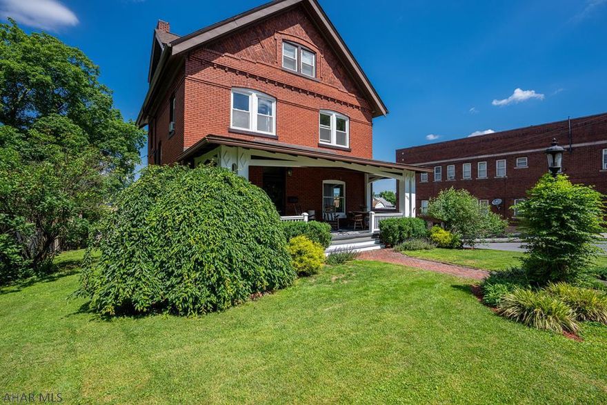 Altoona. Great family home from a bygone era. This 4 BR offers all the modern conveniences. Spacious foyer to bright living room through sliding pocket doors. Cozy updated kitchen to rear patio w/beautiful views. 3rd floor features a sitting area, BR and BA. The walkout basement offers a finished rec room. Rear 2 car garage was converted to a pottery studio w/separate heat and new electrical.