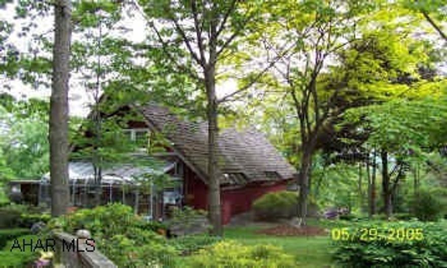 Red Cedar A Frame on 1 1/2 acres. RAYSTOWN LAKE AREA.    RAYSTOWN LAKE AREA.  Present owner built home as their retirement home. Incredible A Frame with many extras and landscaping that will take care of itself. Just add someone to enjoy.