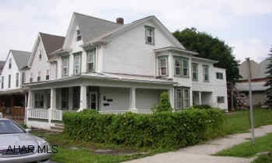 CURRENTLY DUPLEXED EASILY CONVERTED BACK TO SINGLE FAMILY HOME WITH TWO FULL BATHS, 4 BEDROOM, APPLIANCES, 2 CAR GARAGE, STORAGE SHED.