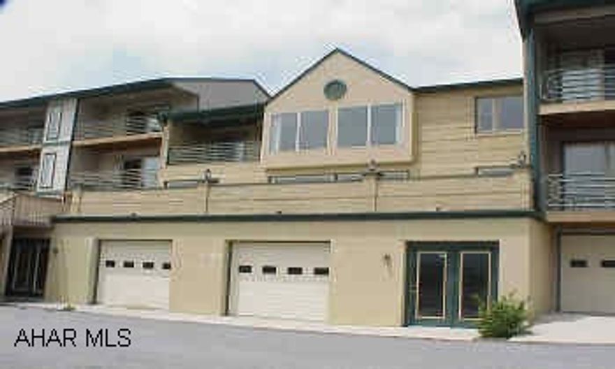 The middle level of this building houses a common room and shares mechanical systems.  The HOA includes trash, snow removal, building insurance, and yard maintenace.  The sale included center area formerly the "Party Room".  Center area consists of approx. 1500 sq. ft., recreation area with wet bar, shower room with 2 shower stalls & 1 urinal & storage room.