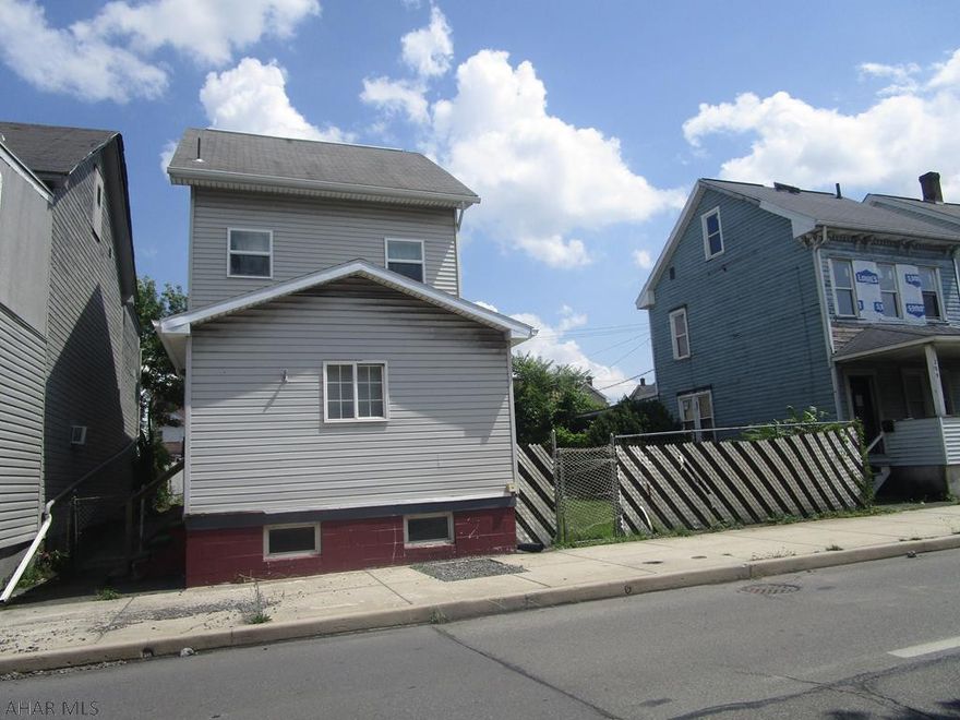 2.5 story of in the city of Altoona. 3 bedroom with a finished attic that could be a 4th. Spacious living room and dining room. Enclosed porch could be playroom or office. Updated kitchen and bath. 1st floor 1/2 bath with laundry hookups. Mud room off back door. Plenty of off street parking. Double fenced lot!!!