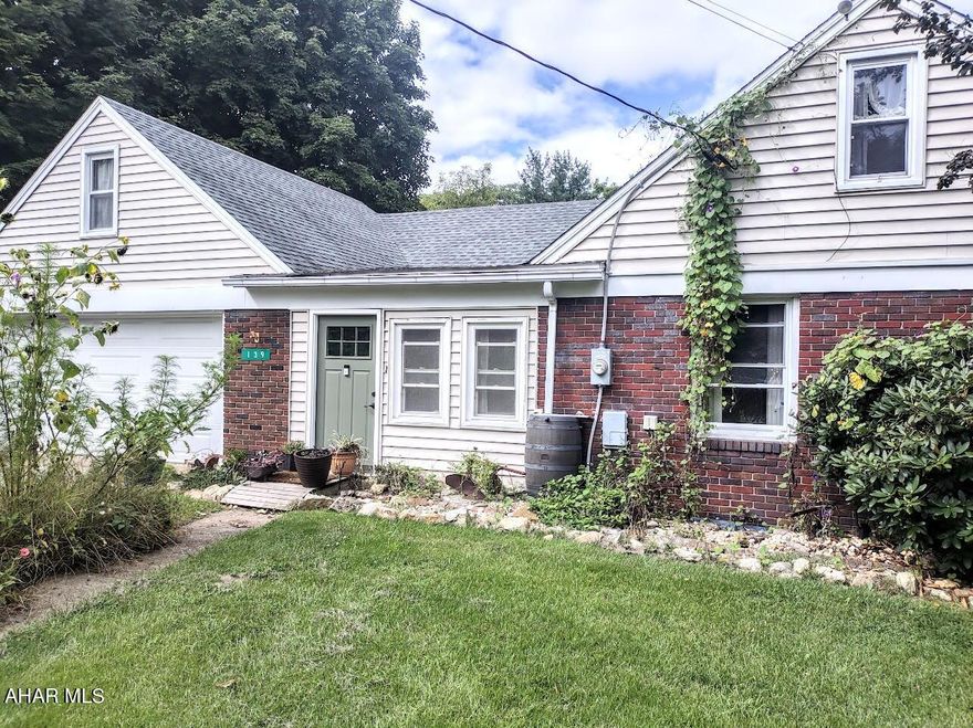 This Charming one-story brick home is ready for you to move in.  This home includes eat in Kitchen, Dining Room/Office, 2 Bedrooms - 1 full bath.  Breezeway - Garage - Full basement with room ready to set up as your entertainment room. Attic that could be used as additional space. Covered patio on back of house. Nice yard.  A must see. Close to restaurants, stores.