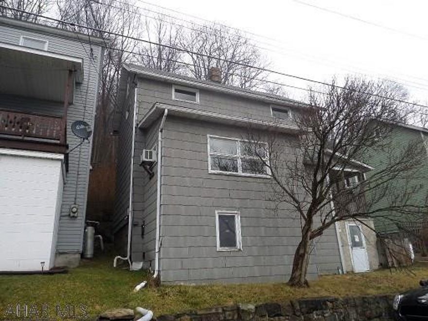 Spacious 2 story with large living room, view from bonus room and covered porch, freeze damage, property being sold as-is, Buyer must pay 2% transfer tax. This property eligible under Freddie Mac First Look Initiative through 3/1/17. Call agent for details