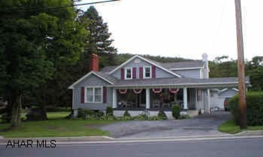 Move in condition - beautiful home w/ 2 lots (58x141 and 48x141), above ground pool w/ 2 tier deck, garden pond, carport and 2 car garage.  Ceramic tile, fireplace, first floor laundry and much more - VERY NICE! Large eat-in kitchen w/nook that has cathedral ceilings and a sliding glass door that leads to the deck and pool.  Must see!