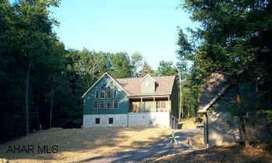 New Construction-Open Architechture with wooden ceilings and floor-21' ceilings in Family Room- Secondary 3 car garage w/800 Sq Ft.In Law Suite Above- Oak Doors and Trim