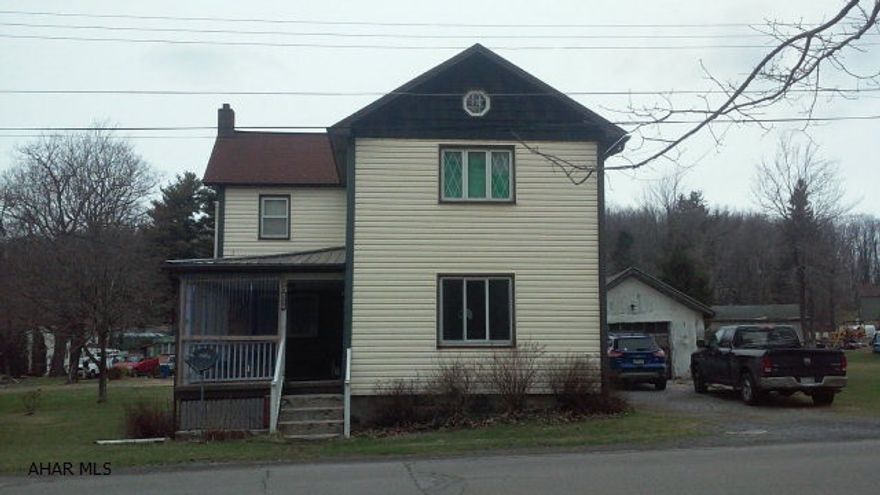 Nice home in historic Blandburg. Updated kitchen with lots of cabinet space. Original wood work in dining room and living room with access to the side covered porch. Spacious master bedroom. The walk up attic has plenty of storage space. New vinyl windows. Wood pellet stove. Good size lot with off street parking. Lot across street also available!