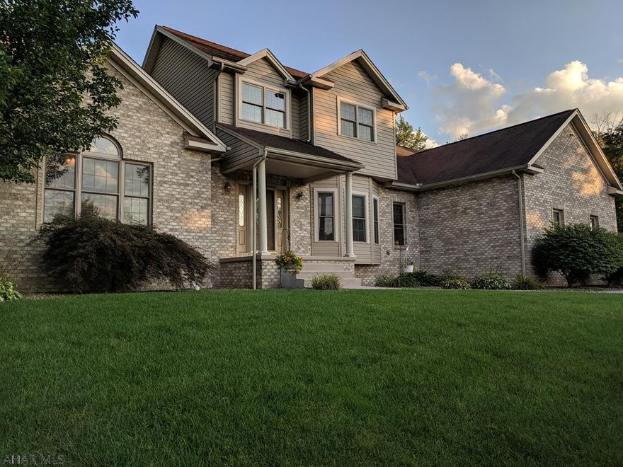 Stunning custom home built by Crossman, Castle & Morina with exceptional quality construction.  This home features 4 bedrooms and 3 baths with an open floor plan.  First floor master bedroom has double door entry with trey ceiling.  Master bath includes Jacuzzi tub, double sink vanity and large walk-in closet.  The spacious 3 car garage goes right into the laundry/mud room where you will find double closets, washer/dryer and laundry cabinets. Main floor boasts a fantastic 2 story foyer entrance that leads to the spacious kitchen.  Solid maple cabinets, prep sink in the L shaped island and a two-tiered countertop with attached bar seating adds to the beauty of this custom built kitchen!  Eat in the breakfast nook with spectacular views of the well-maintained backyard and landscaping.