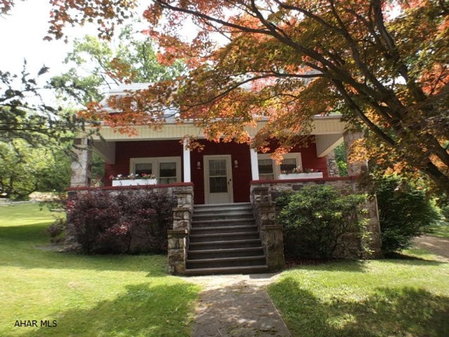 BRAND New price!  200 PLUS acres you and every homeowner in this quaint  (10 home) site gains access to.  So, enjoy the outdoors, walking, hiking, hunting, you name it!  This particular home sits on .26 acre.  More spacious than you may think once you are inside.  The kitchen is updated and very functional.  The living room is so spacious you could actually split in two areas (maybe use one portion as a den area if you).  The VIEW of the mountains are absolutely stunning and just serene.  This is one of the uniquely different homes - not your cookie cutter type of situation when you buy this one.   2 minutes from Canoe Creek and 1/2 mile from Rails to Trails (1/2 mile East on Rt 866 from Rt 22) Call listing agent today to schedule your private showing.