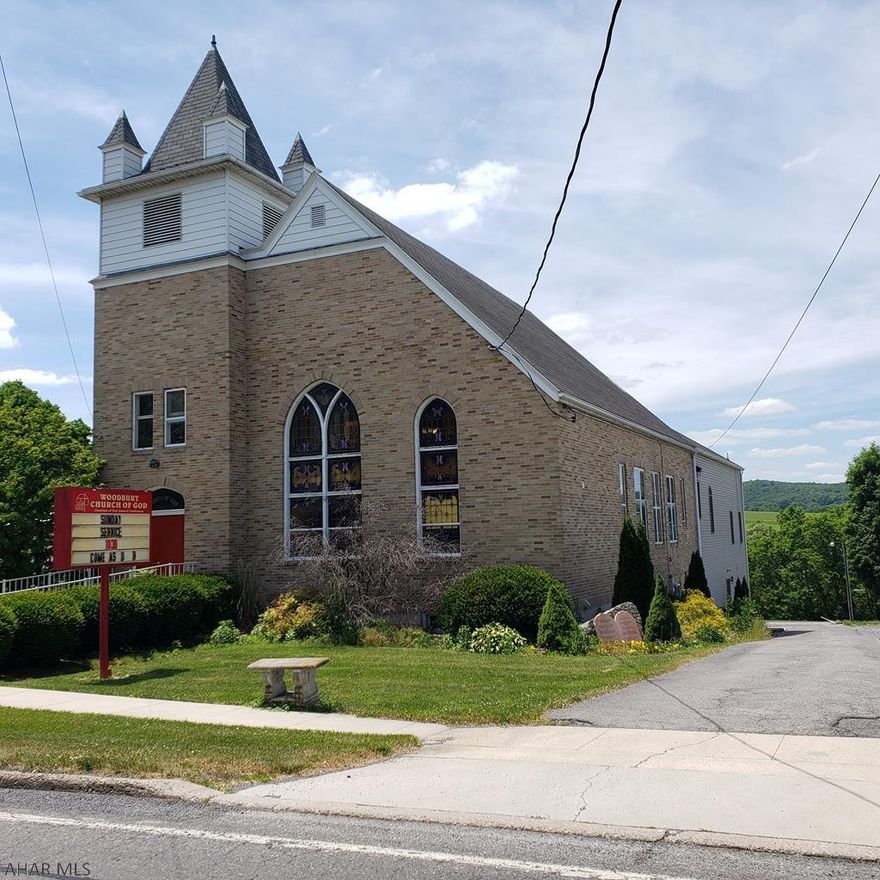 Large commercial building for sale. This property has previously been used as a church with a full finished basement including recreation hall, separate restrooms, full kitchen,  nursery and 3 additional gathering rooms. The main level host a  sanctuary, baptism room, bathrooms and a loft. Having a side and rear lot for parking makes this commercial space perfect! Call listing agent for more information.