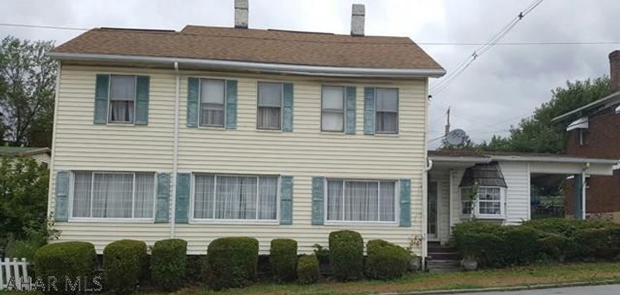 This 4 bedroom, 1.75 bath home has a first floor laundry room, updated kitchen cabinetry, an attached carport, and a detached garage. It also has 3 sheds for plenty of storage! Back door opens to a covered patio and a backyard that feels private and secluded making it perfect for entertaining! Needs TLC but has lots of potential.