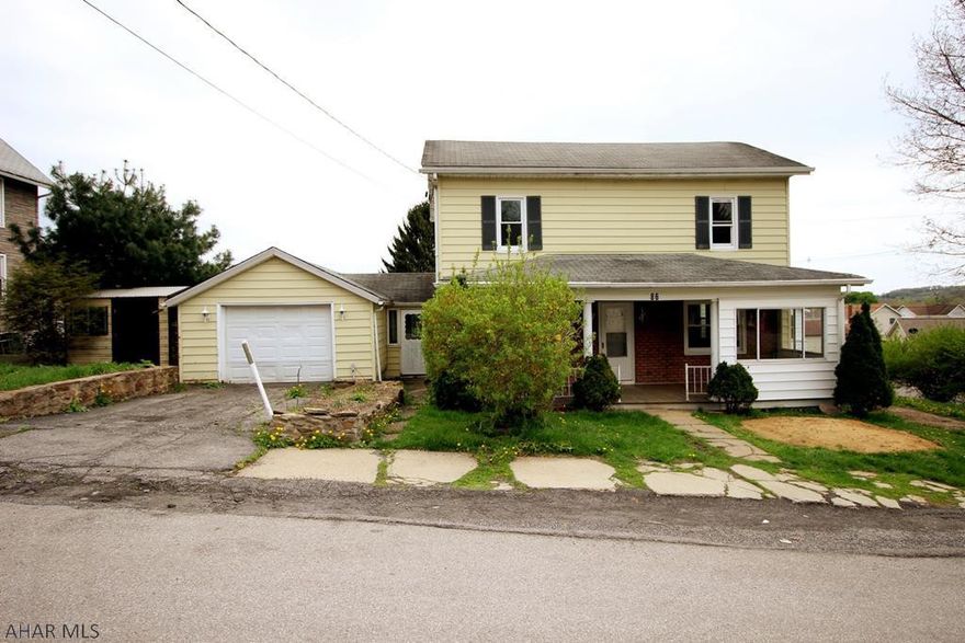 Located on a corner lot in the town of Irvona, this home features 2 bedrooms with wood floors throughout and a singlestall attached garage. Some TLC may be required. REO property being sold "AS-IS."