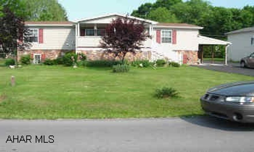 SUPER ONE STORY MODULAR ON FULL BASEMENT. IMMACULATELY KEPT AMID BEAUTIFUL FENCED LANDSCAPE. DETACHED 2 CAR GARAGE, 3 BR, 2 BATH.