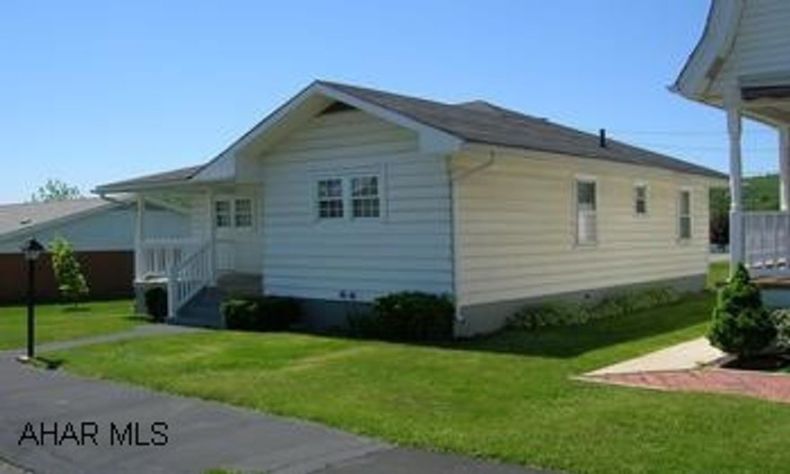 Very clean & neat, 2 bedroom home with a nice yard THis home has a new front porch, new windows, roof & carpet. Must see inside!!