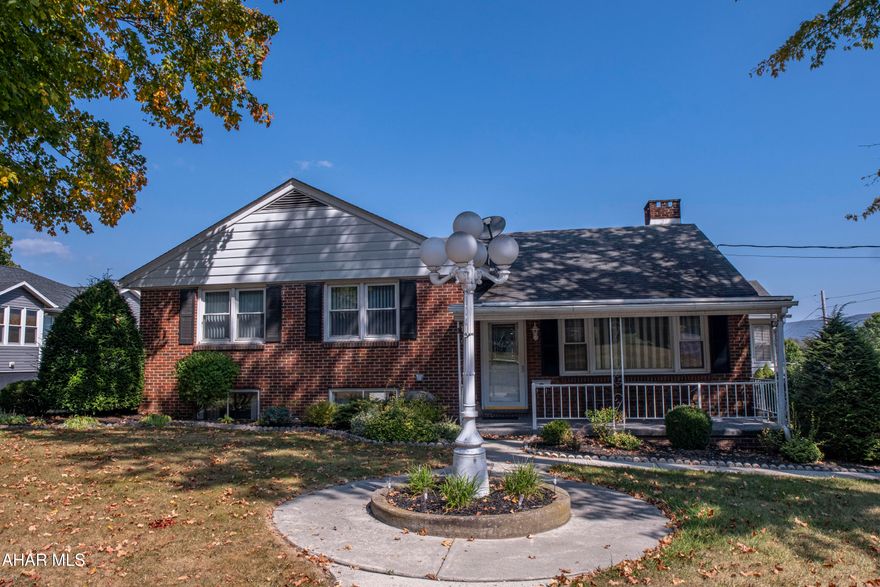 Welcome to this beautifully maintained brick home nestled on a desirable corner lot in  Williamsburg Borough. This residence seamlessly blends classic charm with modern comfort, offering generous living spaces both indoors and out.

The traditional brick exterior speaks to quality and durability. Inside, the home offers a comfortable layout featuring three spacious bedrooms and one full, well-appointed bathroom.

The main living area is designed for both relaxation and entertaining, boasting a large living room and an expansive family room, providing plenty of space for gatherings. The home's ambiance is enhanced by two charming fireplaces—
Storage and utility space are abundant thanks to a walk-out basement that offers easy access to the yard and a walk-up attic that provides great potential for storage or future development. Parking is convenient with a two-car integral garage that adds security and protection from the elements.

Situated on a beautiful corner lot, the property enjoys excellent curb appeal and a pleasant setting within the borough. This home is ready to provide its next owners with a perfect blend of space, comfort, and prime location. Schedule a tour.