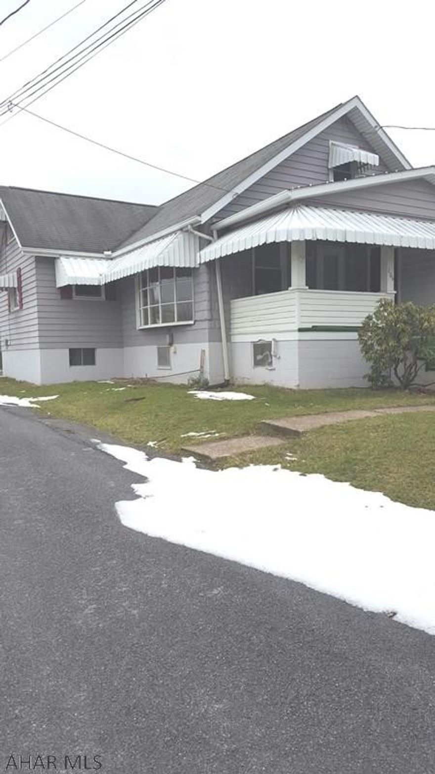 Cute home with huge kitchen and living room with hardwood floors.  Convenient first floor laundry.  Big enclosed patio.  Your chance to purchase in Hollidaysburg School District at an affordable price.