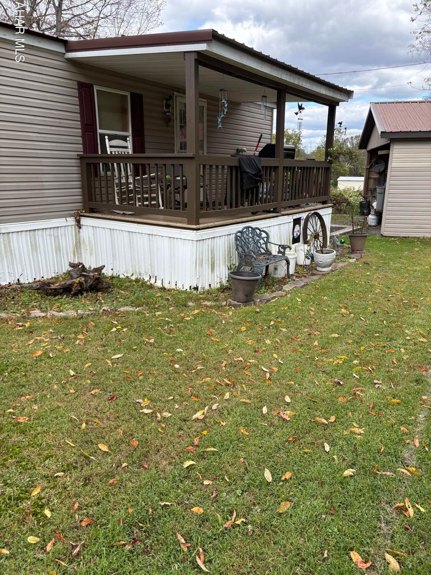Affordable, low maintenance home with room to breath situated in a farm setting and less than 4 miles from Chestnut Ridge Schools. The layout is practical and comfortable, making it a good fit for a starter home, downsizing or investment use. Outside you will find both front and back porch, access to Dunnings Creek, a carport for covered parking and  a storage shed for tools and equipment.  The property provides outdoor space without the upkeep of larger acreage - ideal for a buyer who wants elbow room and water access without extra work. Settlement will be subject to approval of subdivision plan.